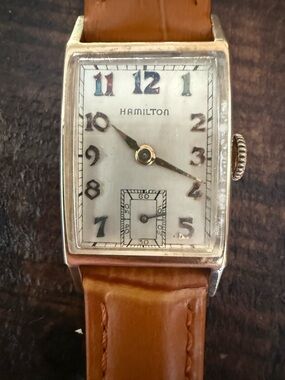 Vintage Hamilton tank-style wristwatch with a 14K gold case marked “14K GOLD
